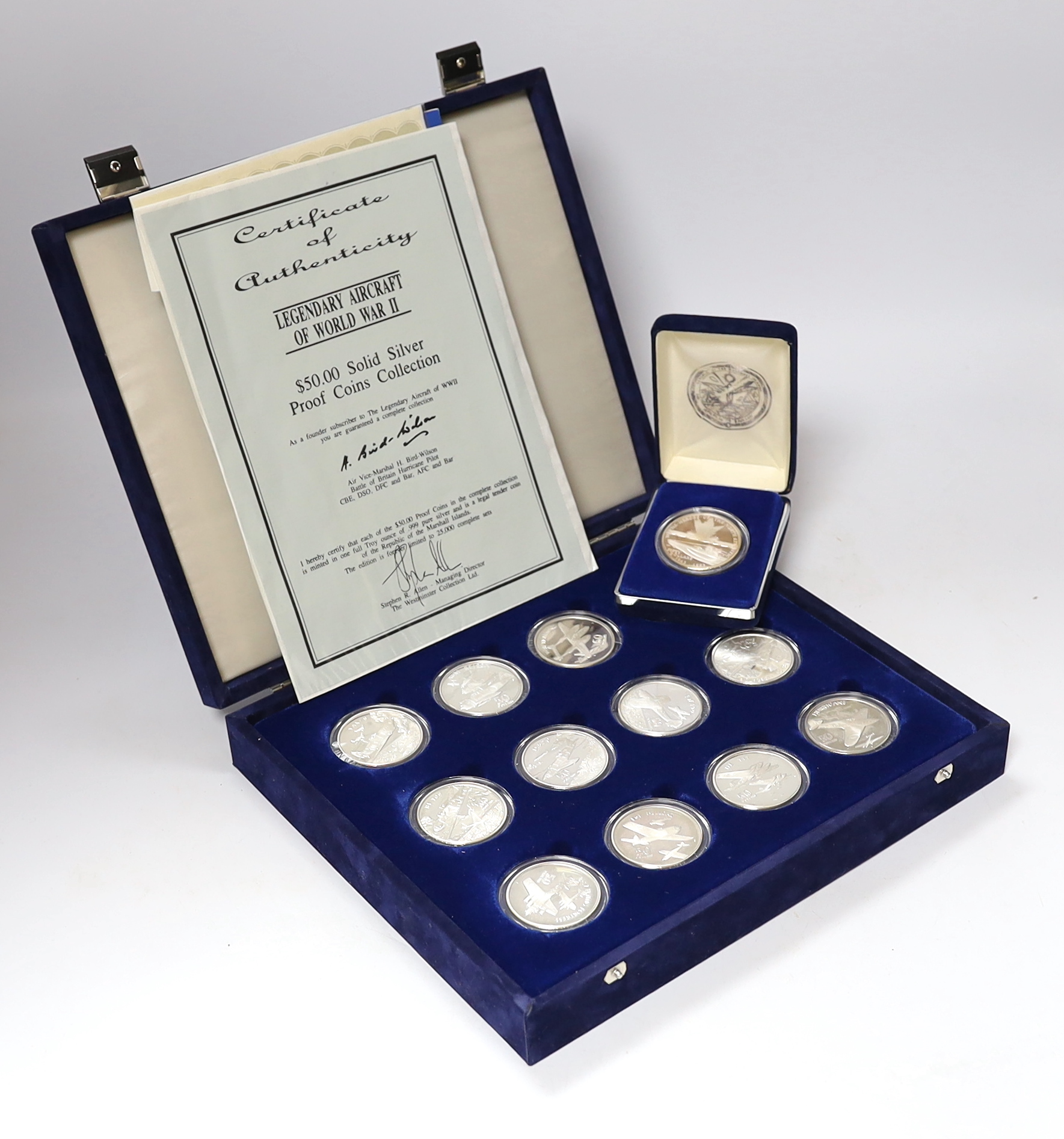 Republic of Marshall Islands, Legendary aircraft of World War II, set of 24 proof silver coins, cased certificate and the Heroes of the North proof silver coin 1993